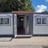 52aa76_2814b956d1944797b11a5354f9d06aa5mv2-600x408-1 Tiny House Deluxe Mobile Container (19 x 20ft), 2023